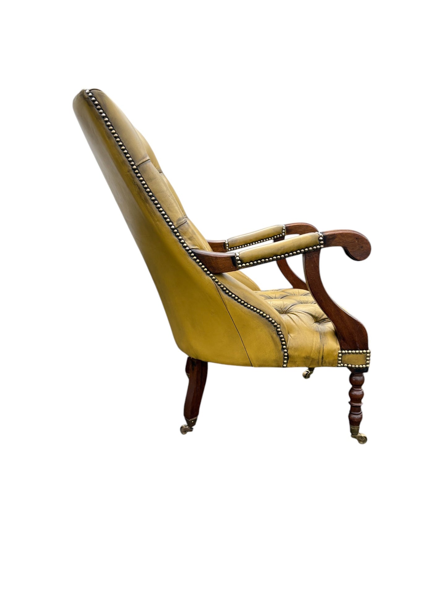 Engelsk Läderfåtölj med hjul av mässing,  Viktoriansk Stil